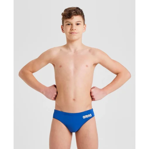 Плавки-сліпи для хлопців Arena TEAM SWIM BRIEFS SOLID синій, білий дитячий 128см (004774-720)