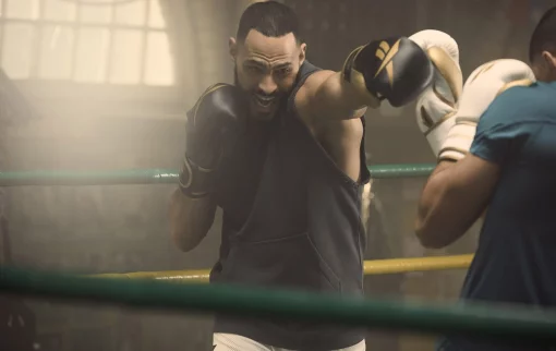 Боксерські рукавиці Reebok Boxing Gloves чорний, золотистий 12 унцій (RSCB-11117GB-12)